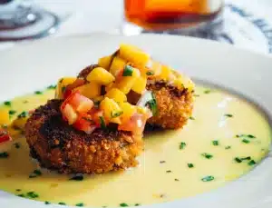 crab cakes with cocktail at fog harbor best seafood restaurant in san francisco